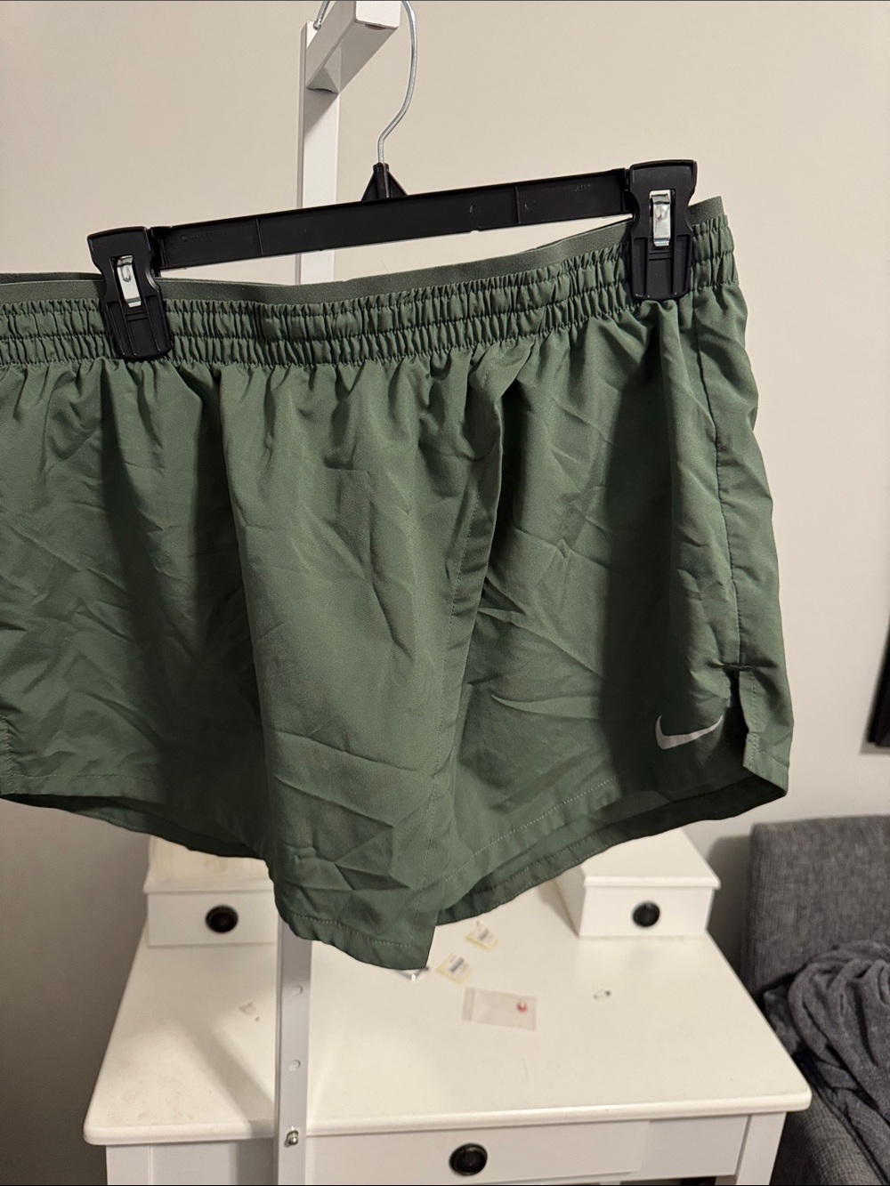 Nike Green Athletic Shorts with White Swoosh